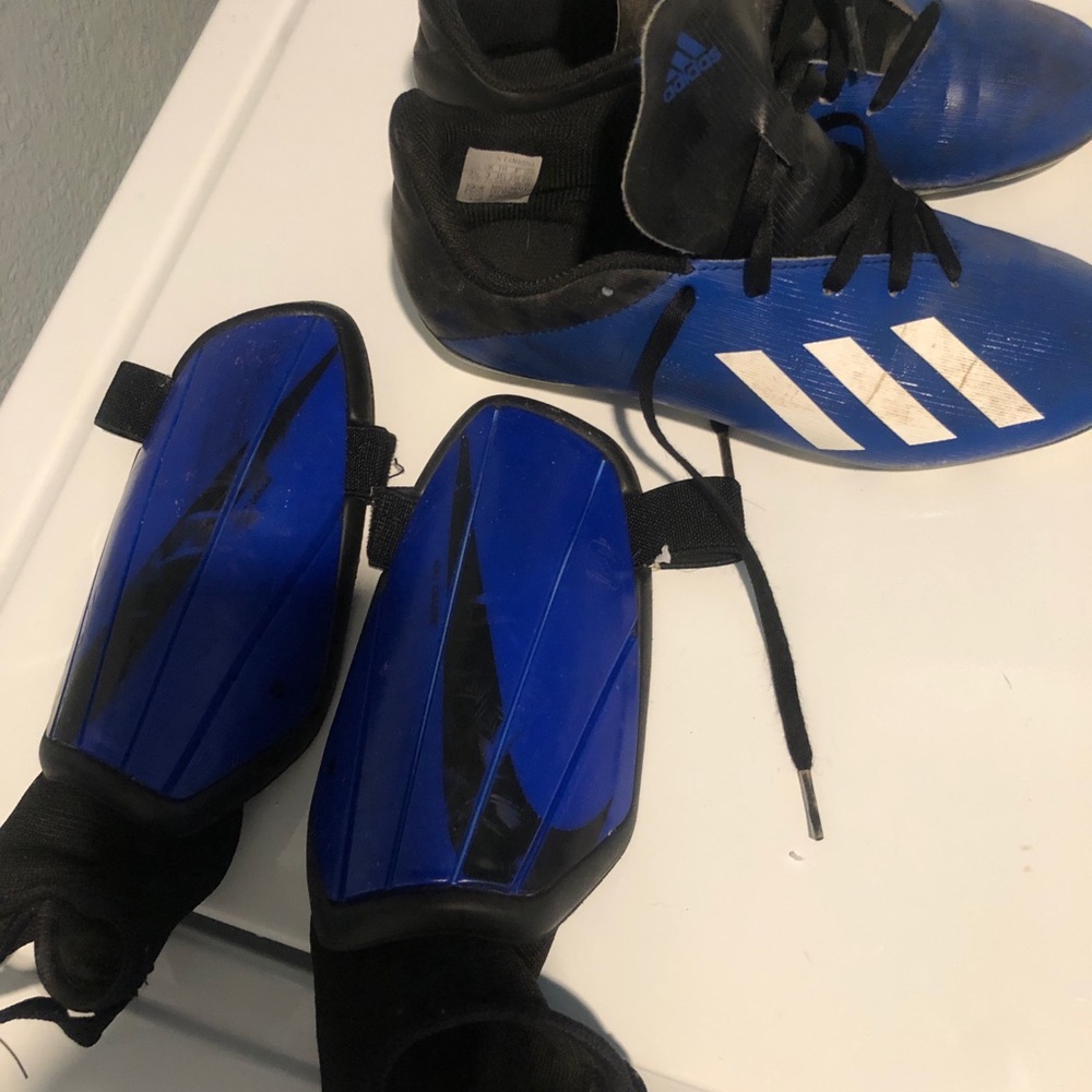 Soccer cleats and shin guards set